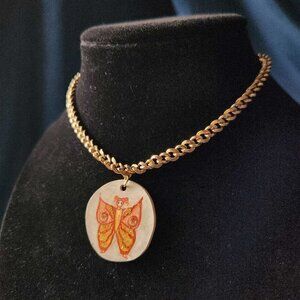 Fairy butterfly pendant on a gold chain necklace